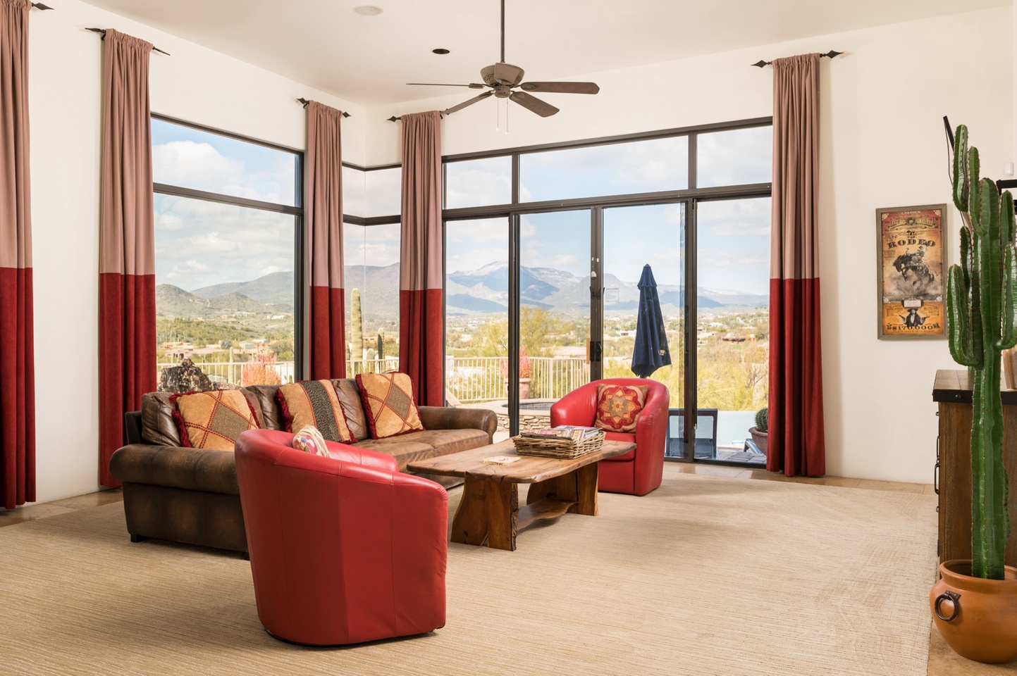 Living room with glass walls to take in all the views