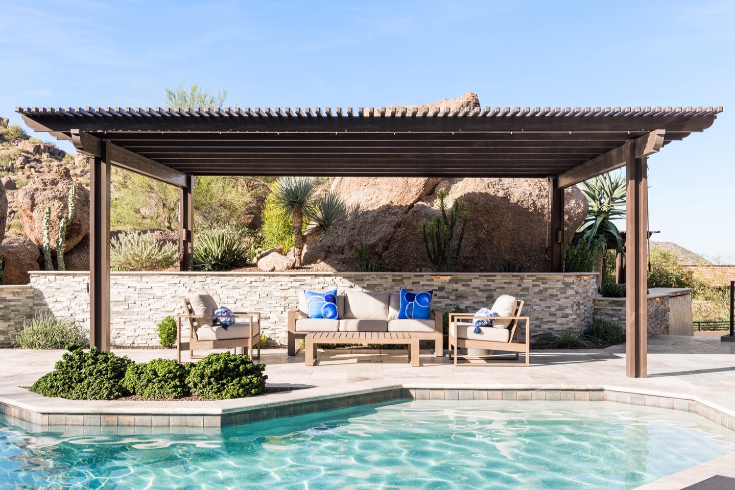 Private pergola perched into the boulders