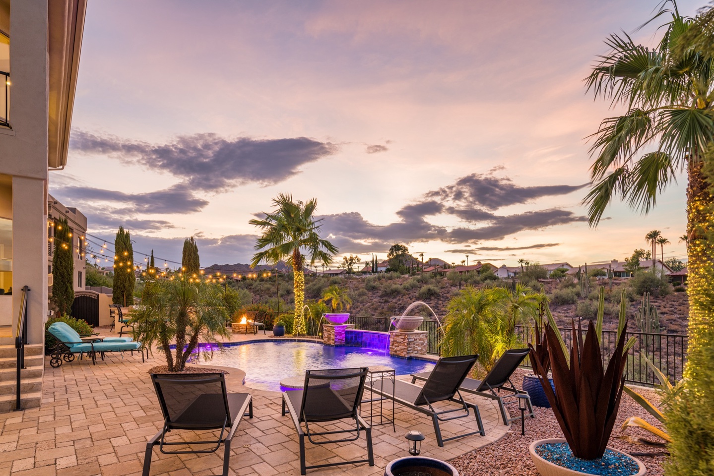 Cool off in the saltwater pool surrounded by palm trees