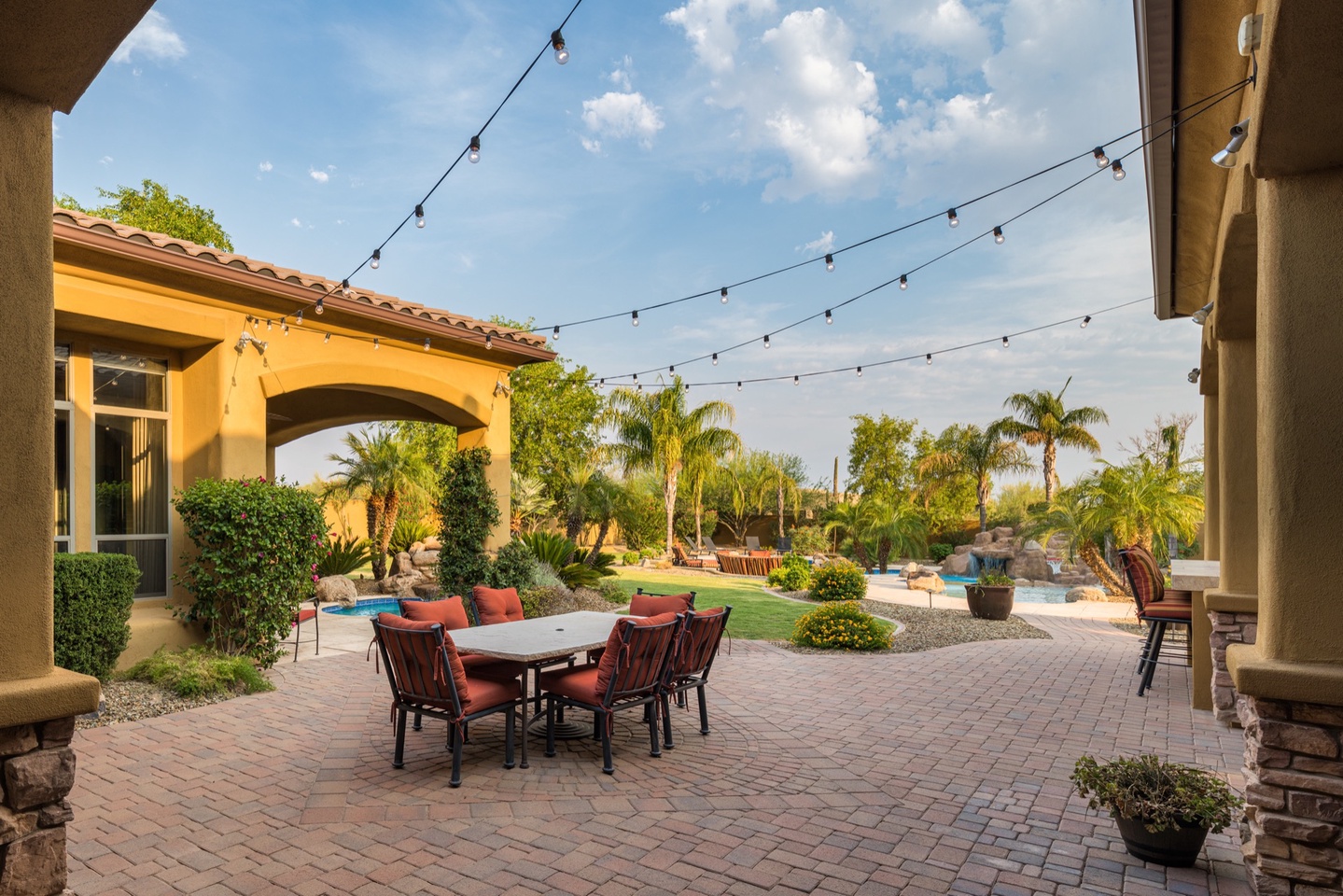 Outdoor dining space under the market lights