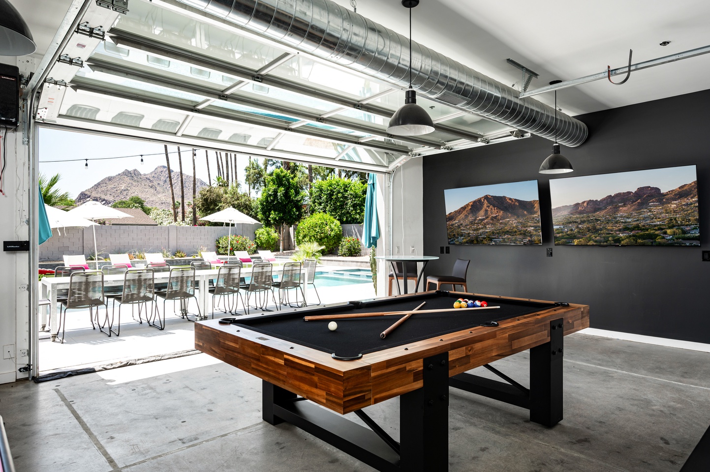 Indoor/Outdoor game-room with views of Camelback mountain