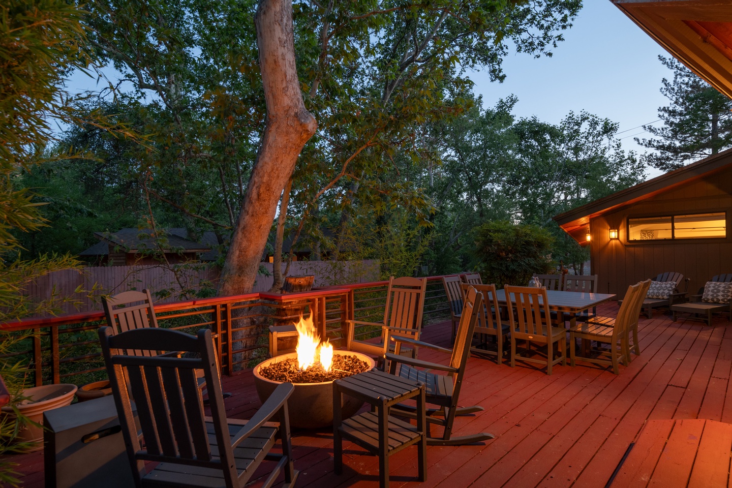 Spacious deck with fire-pit an outdoor dining