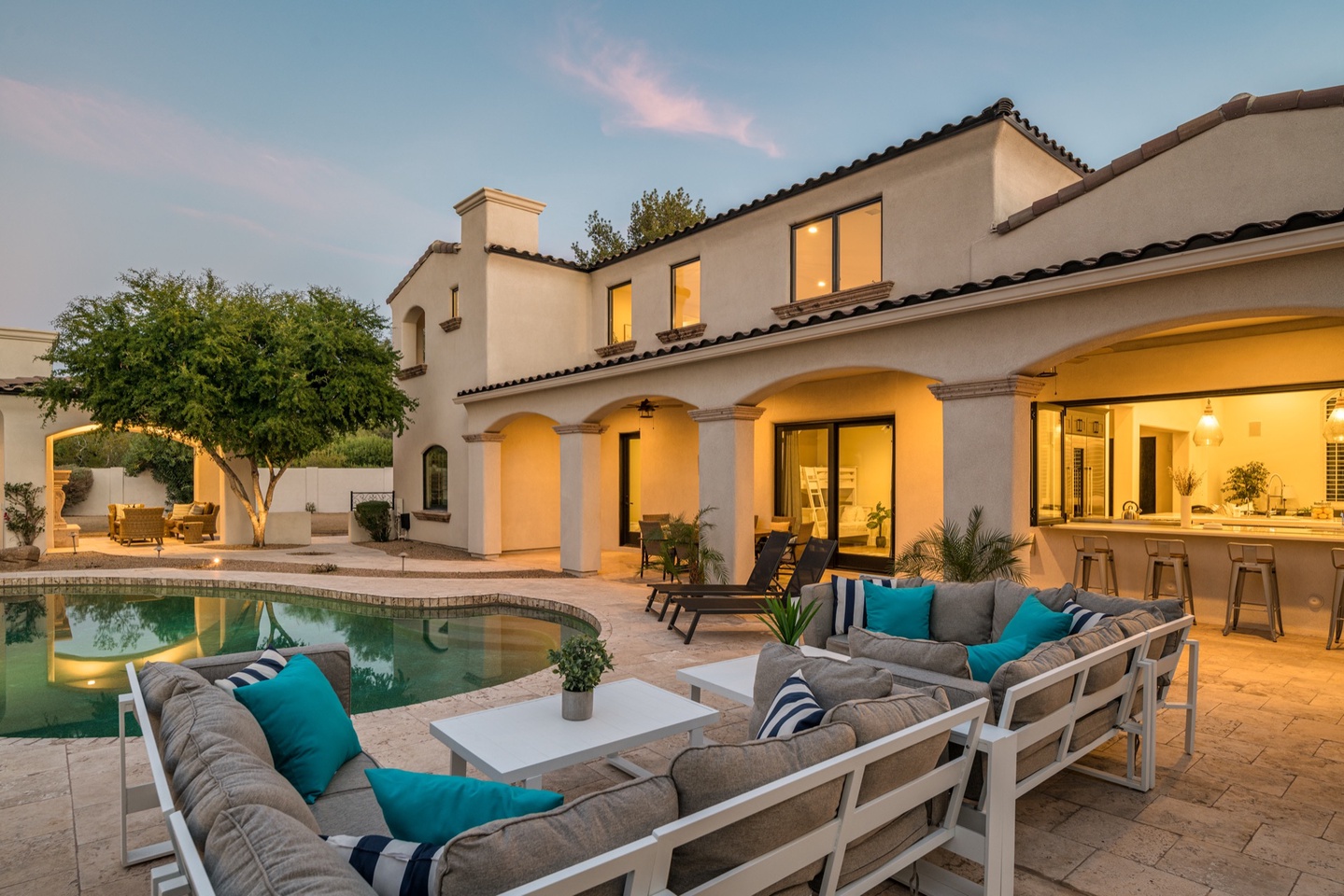 large covered patio with plenty of outdoor seating