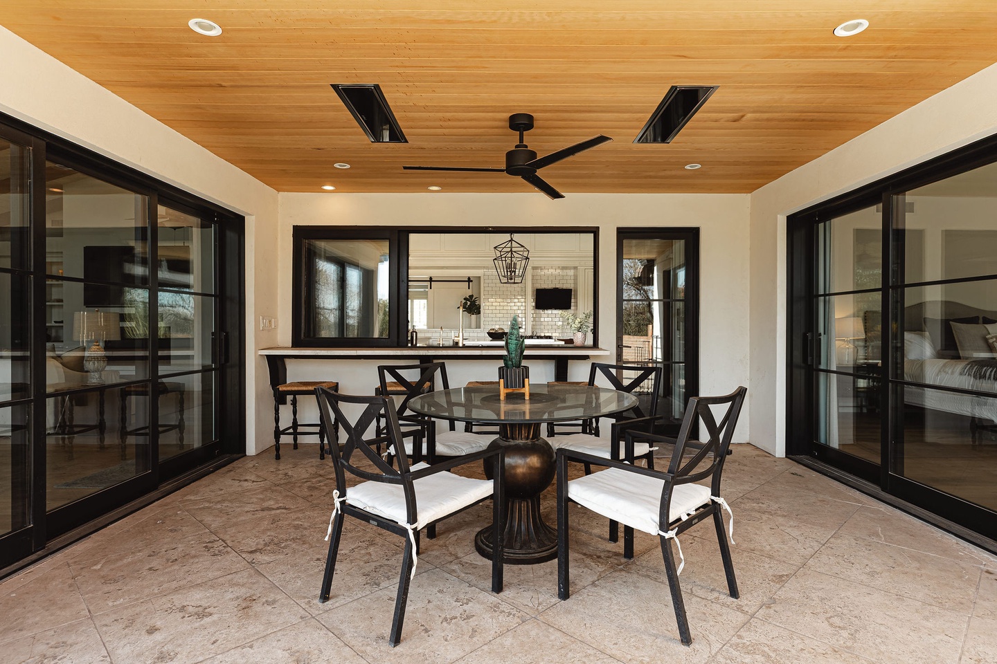 Covered patio off the kitchen with built in heaters!
