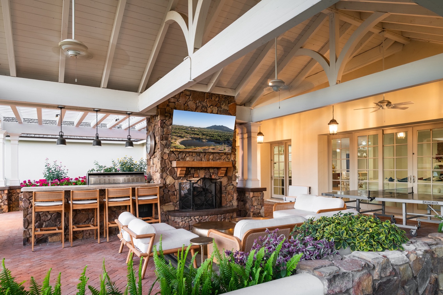 Cozy outdoor TV & sitting area